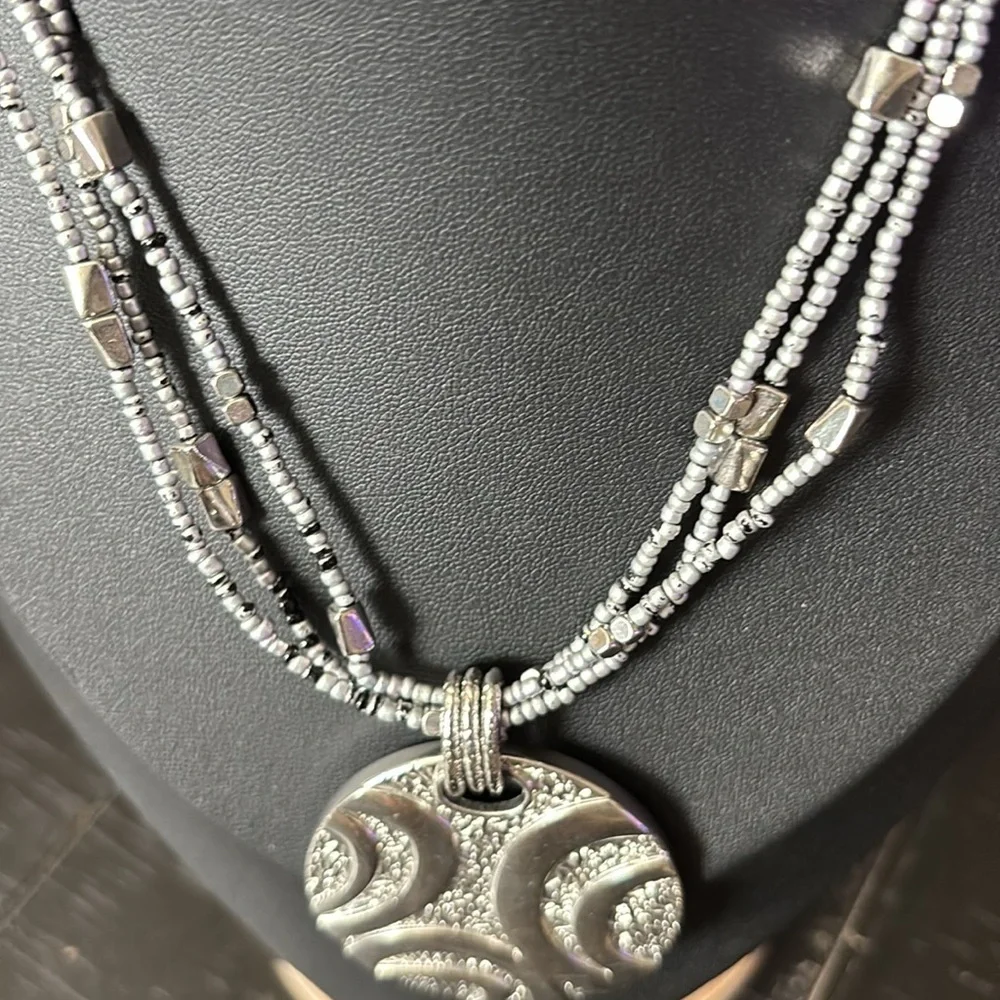 Lia Sophia Silver Tone Multistrand Beaded Circle Pendant